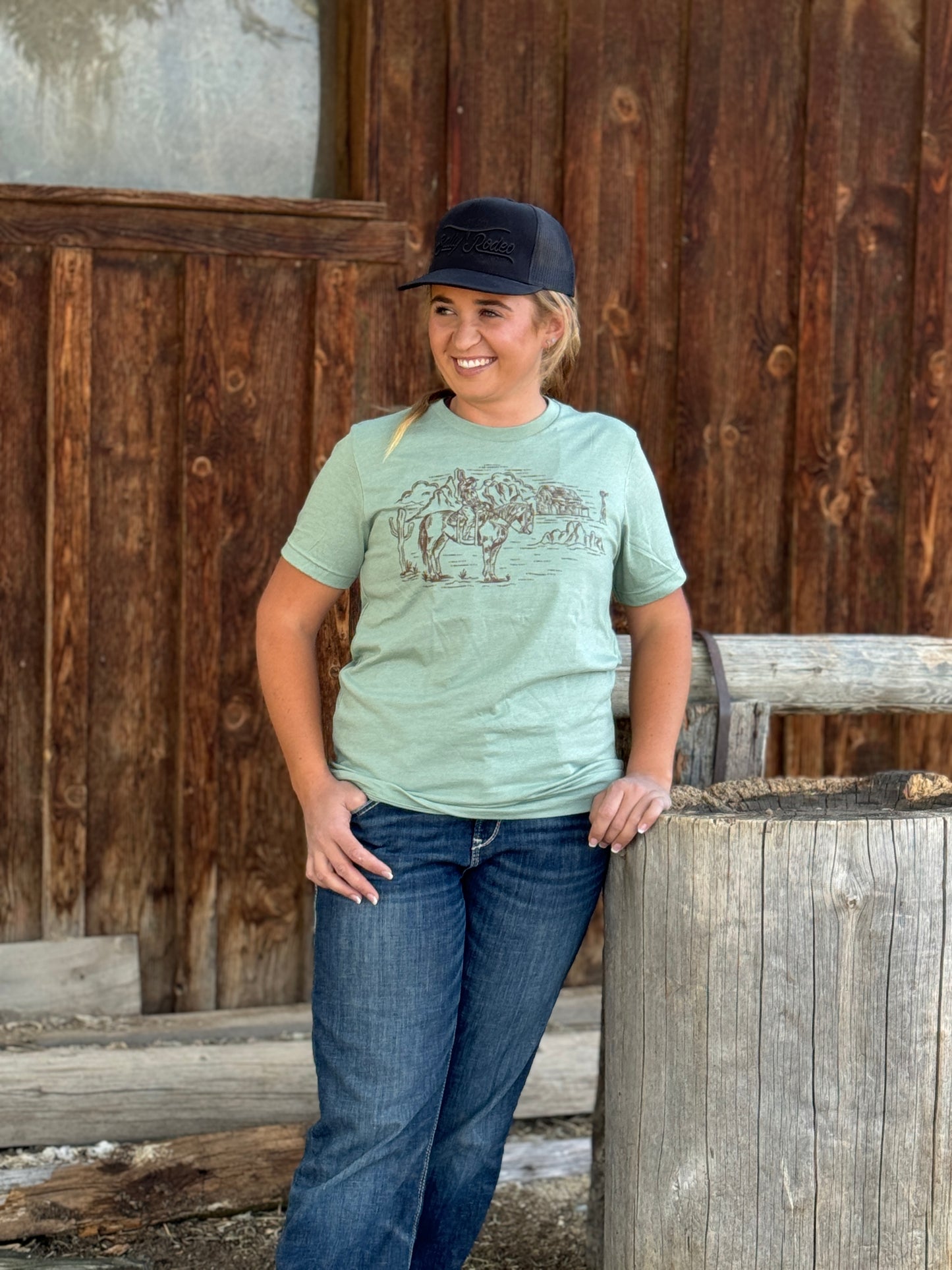 Cowgirl Riding with Windmill Graphic T-Shirt